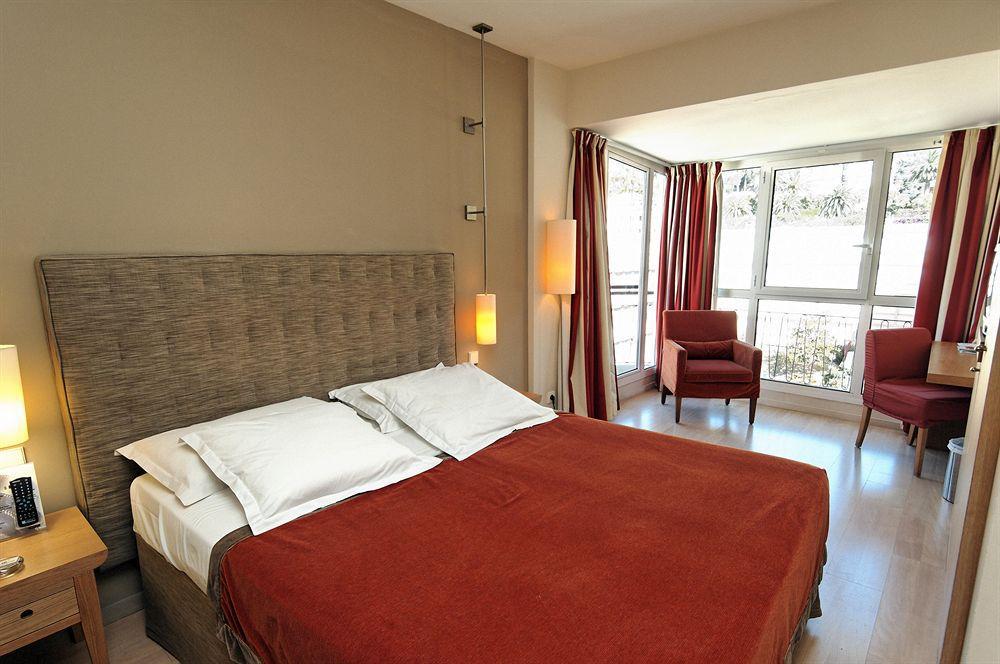 Hotel Napoleon Menton Quarto foto